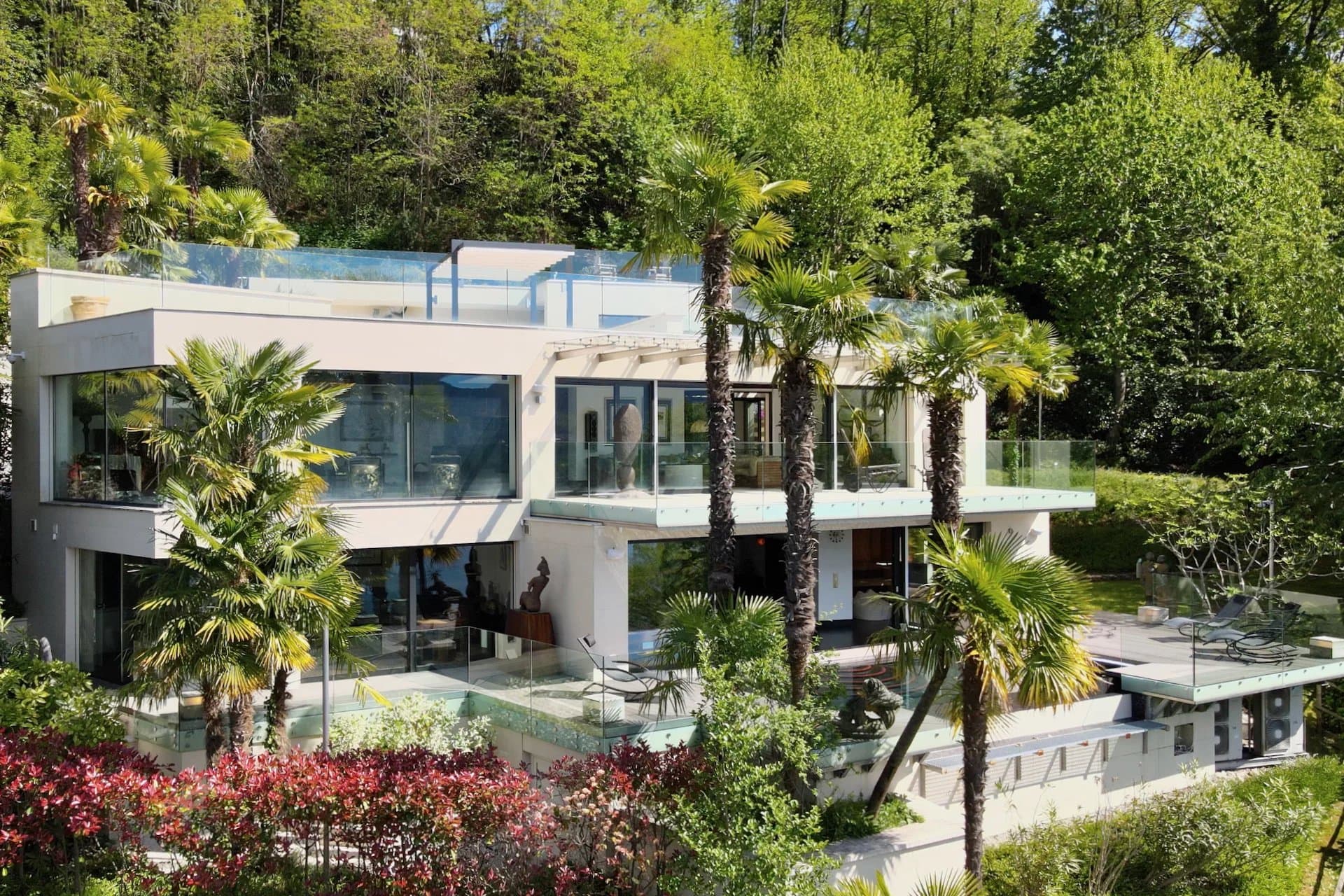 Modern luxury villa overlooking Lake Lugano for sale in Montagnola