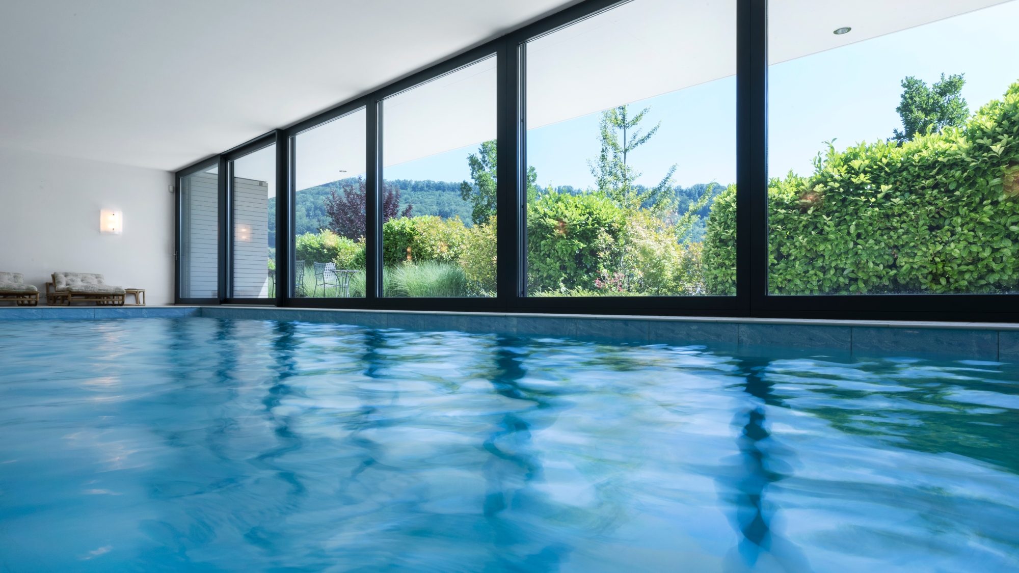 Indoor pool with views of the mountain