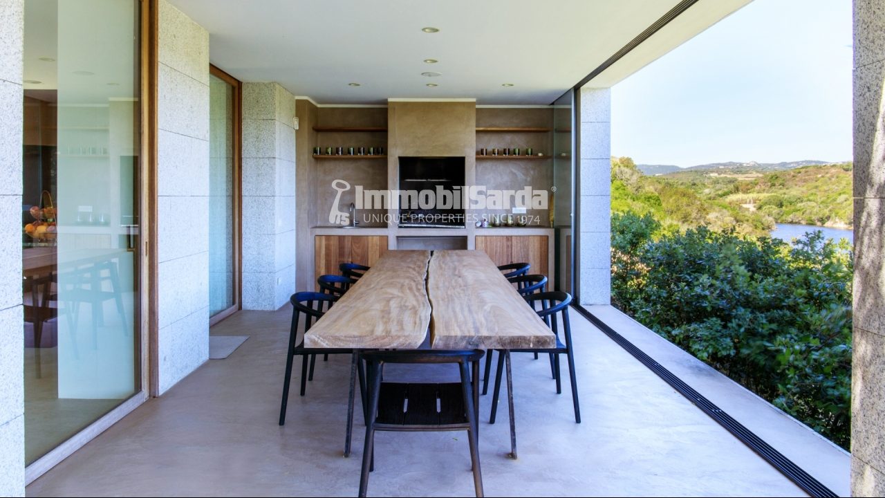 Covered dining area with direct sea views